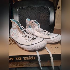 Size 9 woman's Chuck Taylor with multi color paint